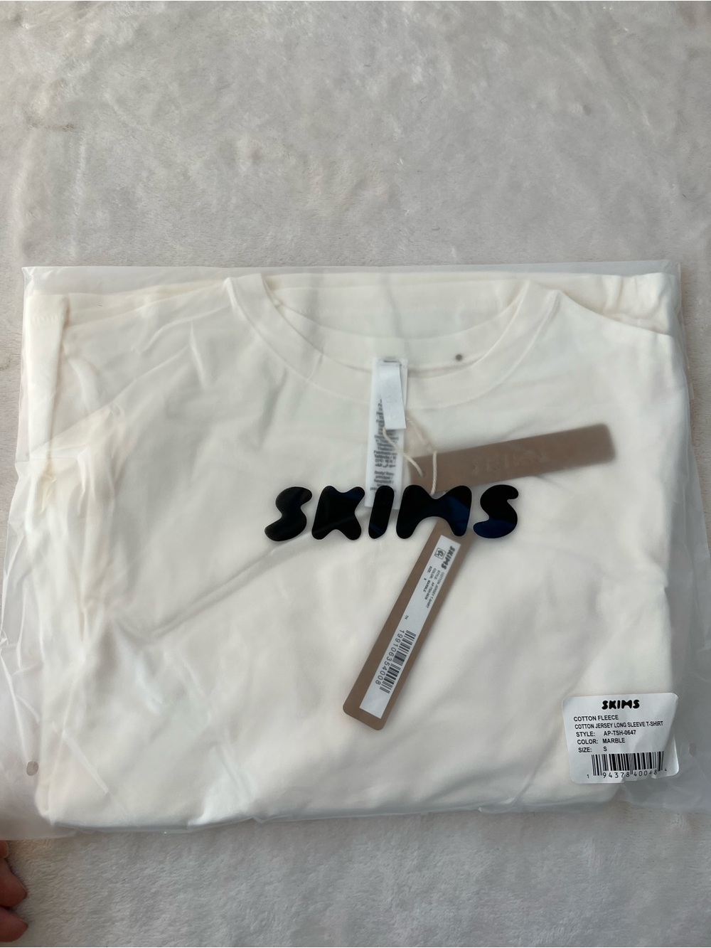 SKIMS Long Sleeve Tee in Cream with Black Logo